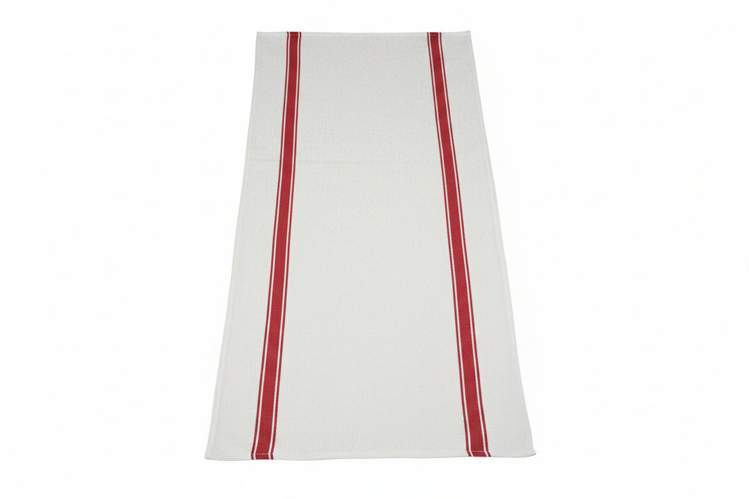 Person holding a large white fabric with red stripes
