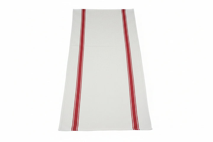 Person holding a large white fabric with red stripes