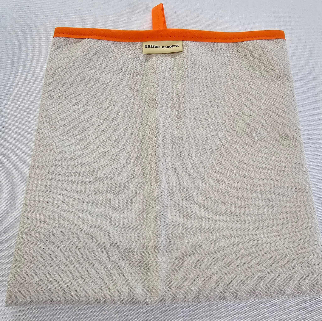 folded oven cloth with orange bias