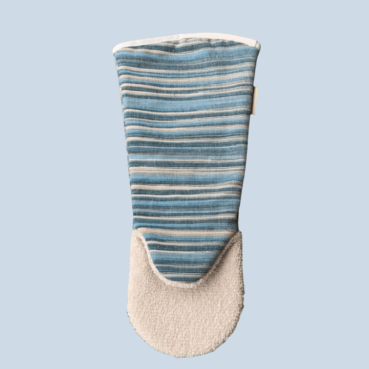 long gauntlet oven glove close up with clear blue background