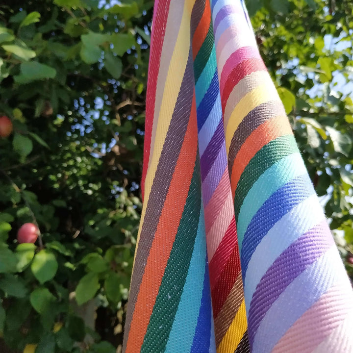 Tea Towel Rainbow section in the sun with trees in the backgeround Maison Elhoria