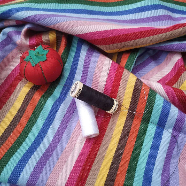 Rainbow fabric organic and recycled cotton with a tomato shaped pins holder and 2 bobbins 